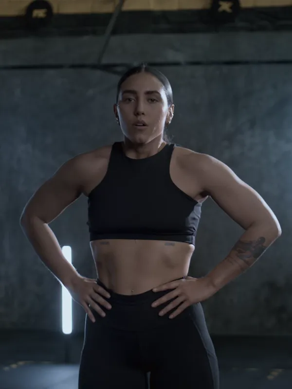 A woman's toned midsection during a workout